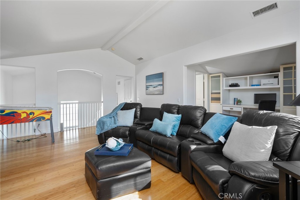 40 Waterspout Irvine, CA 92620 - Photo 29 of 40 a living room with furniture and a wooden floor