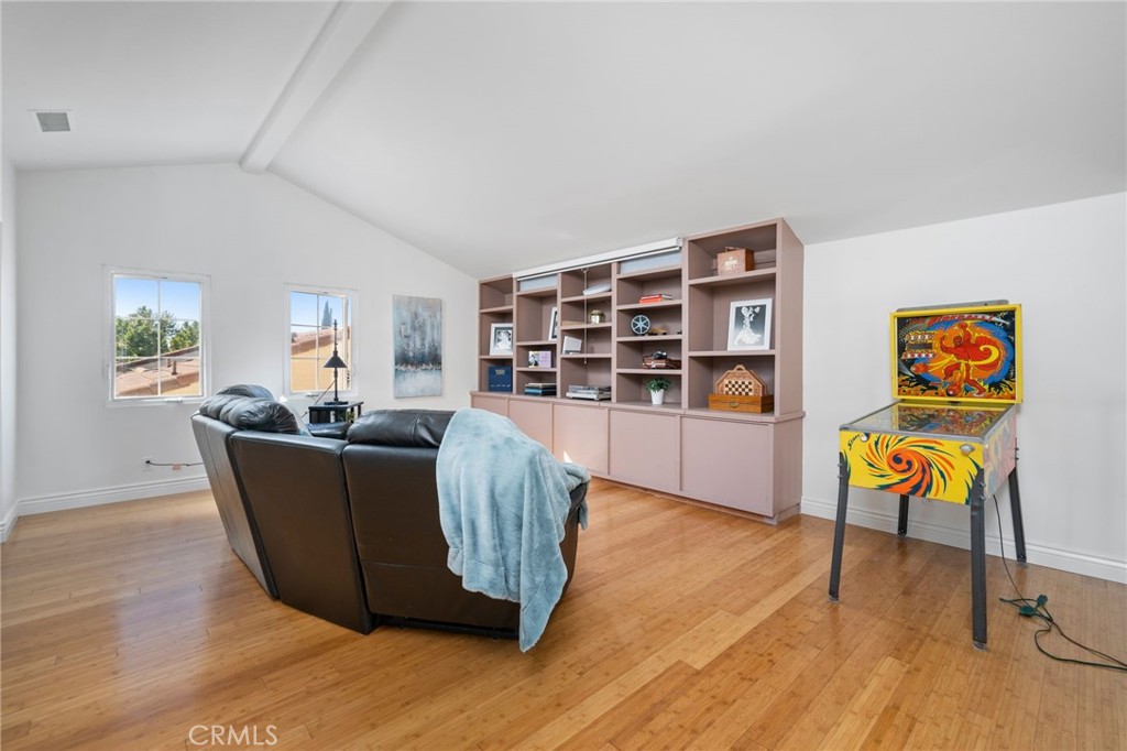 40 Waterspout Irvine, CA 92620 - Photo 31 of 40 a living room with furniture and a wooden floor