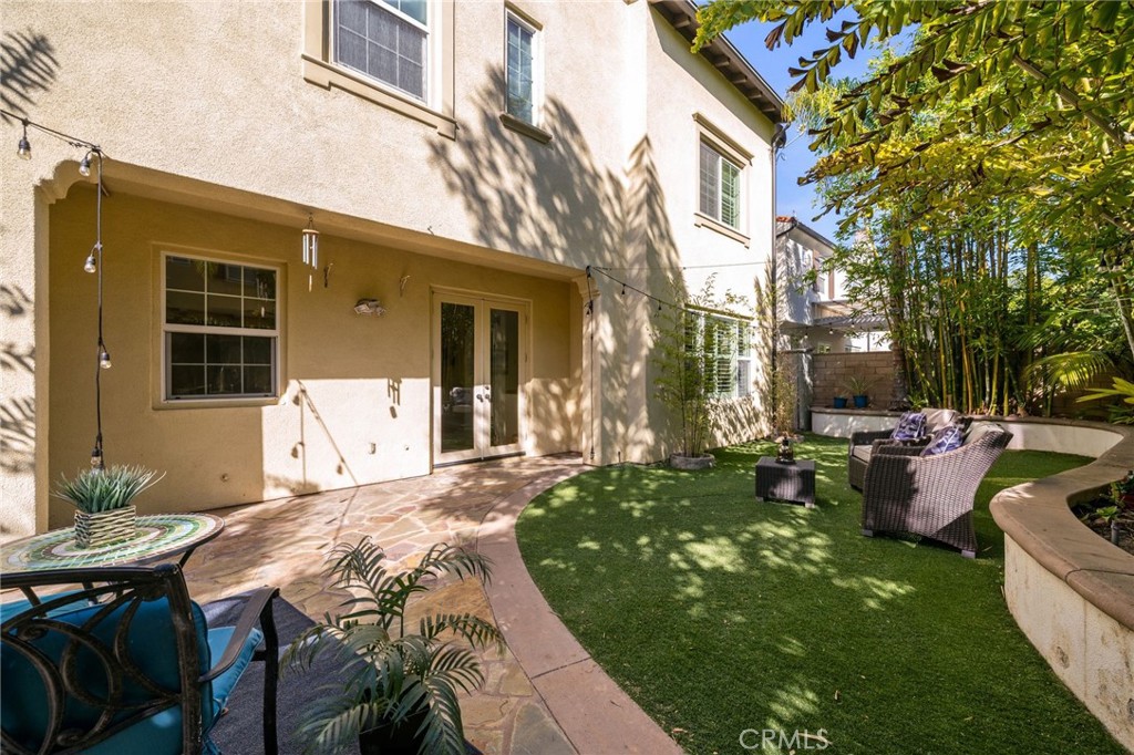40 Waterspout Irvine, CA 92620 - Photo 35 of 40 a view of a house with backyard and sitting area