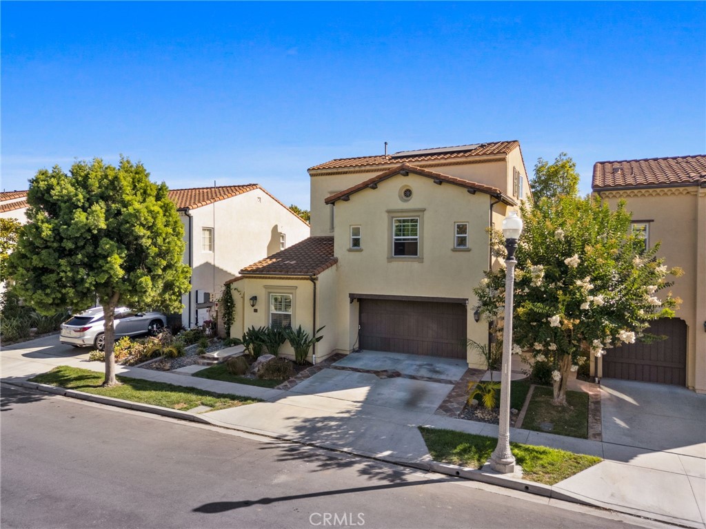 40 Waterspout Irvine, CA 92620 - Photo 37 of 40 a front view of a house with garden
