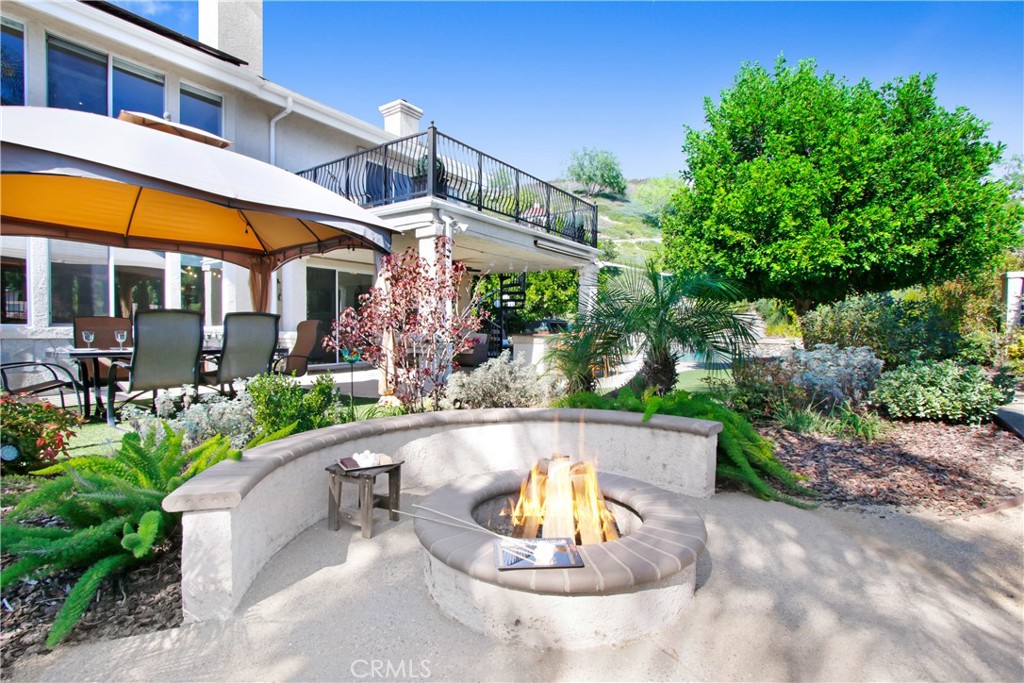 12036 Wood Ranch Road Granada Hills, CA 91344 - Photo 43 of 55 Wood burning fire pit