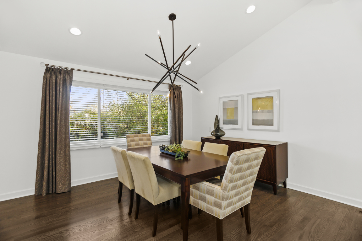 1845 Smith Road Northbrook, IL 60062 - Photo 8 of 38 a view of a dining room with furniture window and wooden floor