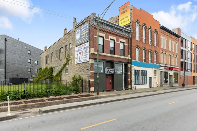 a view of a building on a street