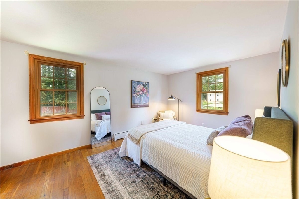 17 Coolidge Street Billerica, MA 01821 - Photo 15 of 32 a bed room with a bed and a window