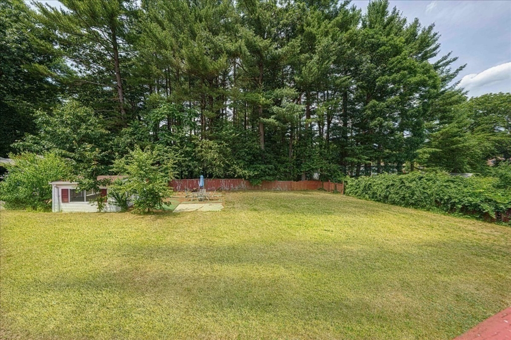 17 Coolidge Street Billerica, MA 01821 - Photo 2 of 32 a view of a swimming pool with an outdoor space