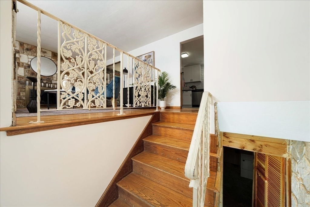 17 Coolidge Street Billerica, MA 01821 - Photo 23 of 32 a view of balcony with large window and potted plants
