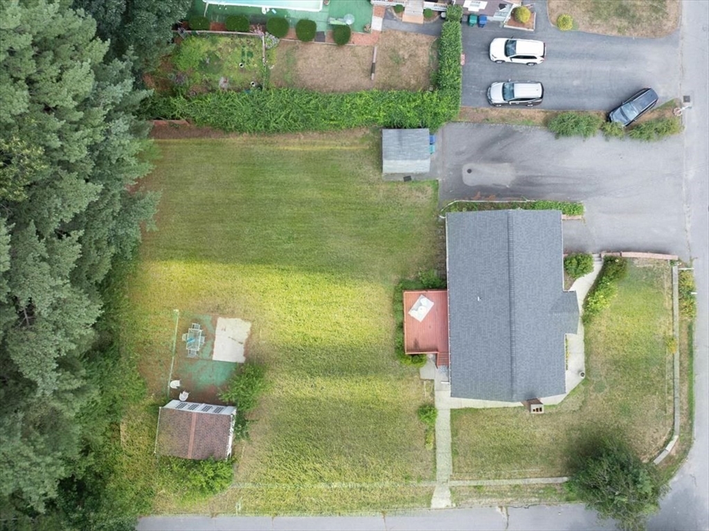 17 Coolidge Street Billerica, MA 01821 - Photo 4 of 32 an aerial view of residential house with outdoor space and lake view