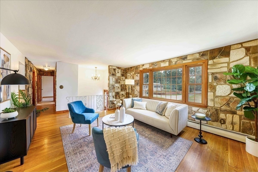 17 Coolidge Street Billerica, MA 01821 - Photo 5 of 32 a living room with furniture and a large window