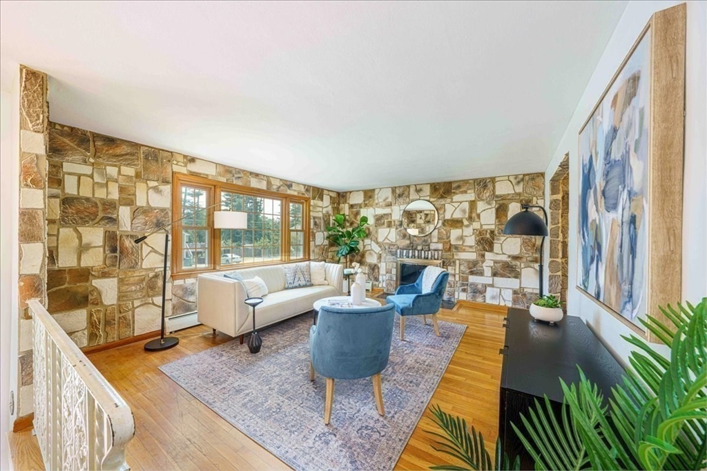17 Coolidge Street Billerica, MA 01821 - Photo 8 of 32 a living room with furniture and a large window