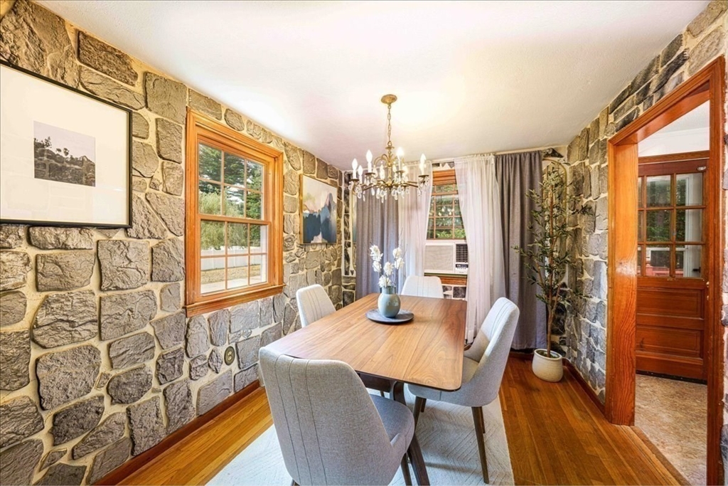17 Coolidge Street Billerica, MA 01821 - Photo 9 of 32 a view of a dining room with furniture and wooden floor