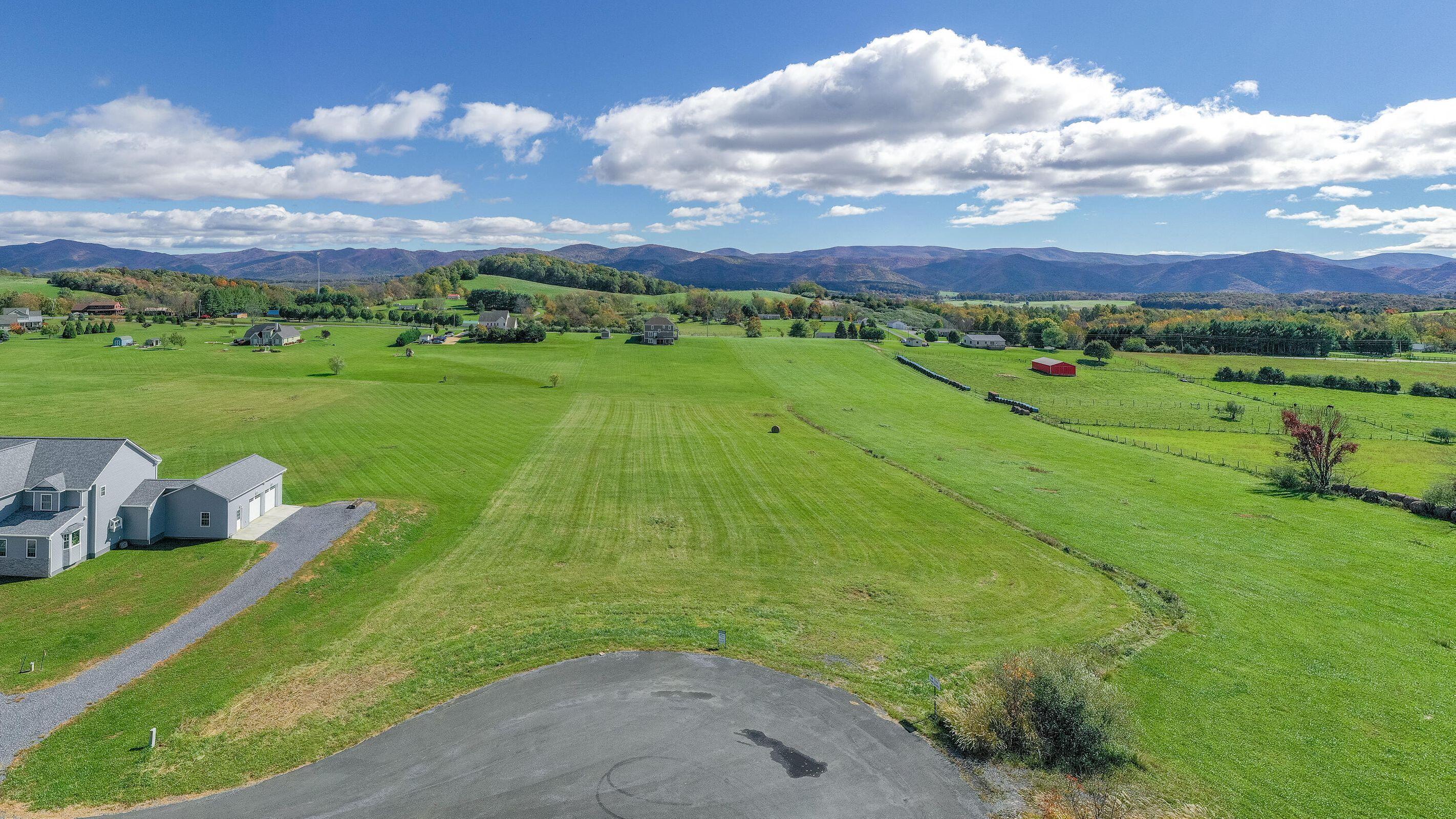 Lot 12 Ridgemore Drive Raphine, VA 24472 - Photo 3 of 6 a view of a golf course with a garden