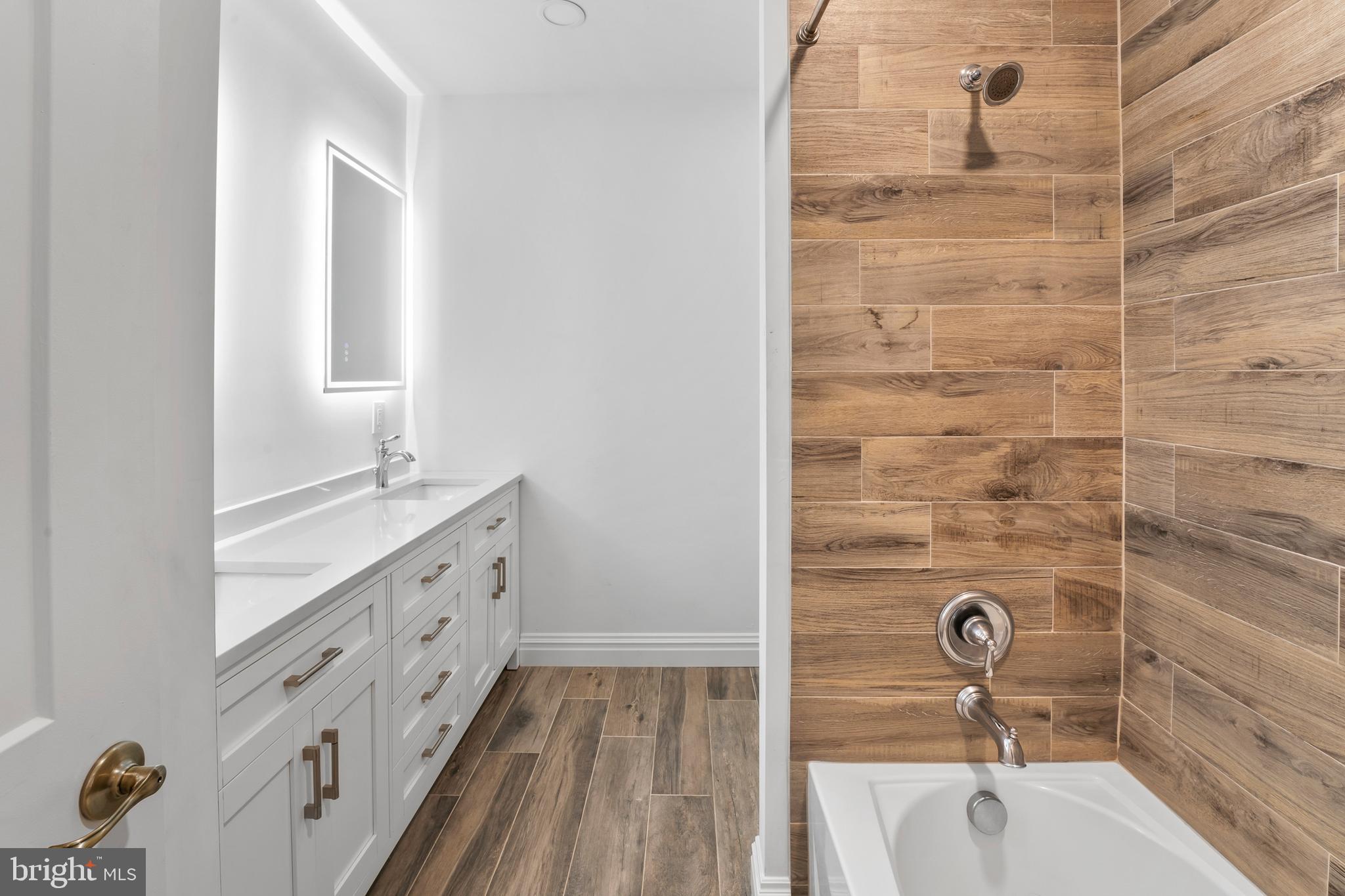 367 Hartford Road Mount Laurel, NJ 08054 - Photo 21 of 35 a bathroom with a tub sink and mirror