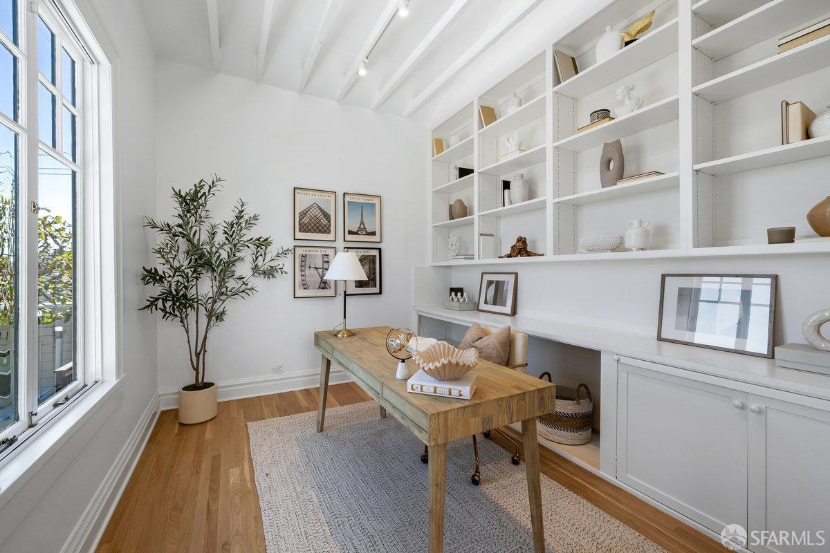 115 Hoffman San Francisco, CA 94114 - Photo 20 of 44 a view of a workspace with furniture and a potted plant