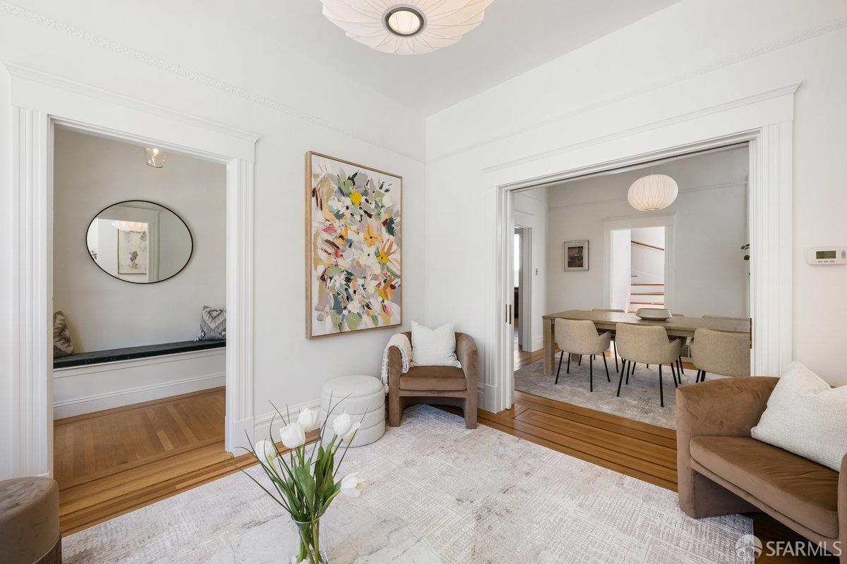 115 Hoffman San Francisco, CA 94114 - Photo 5 of 44 a living room with furniture and a mirror