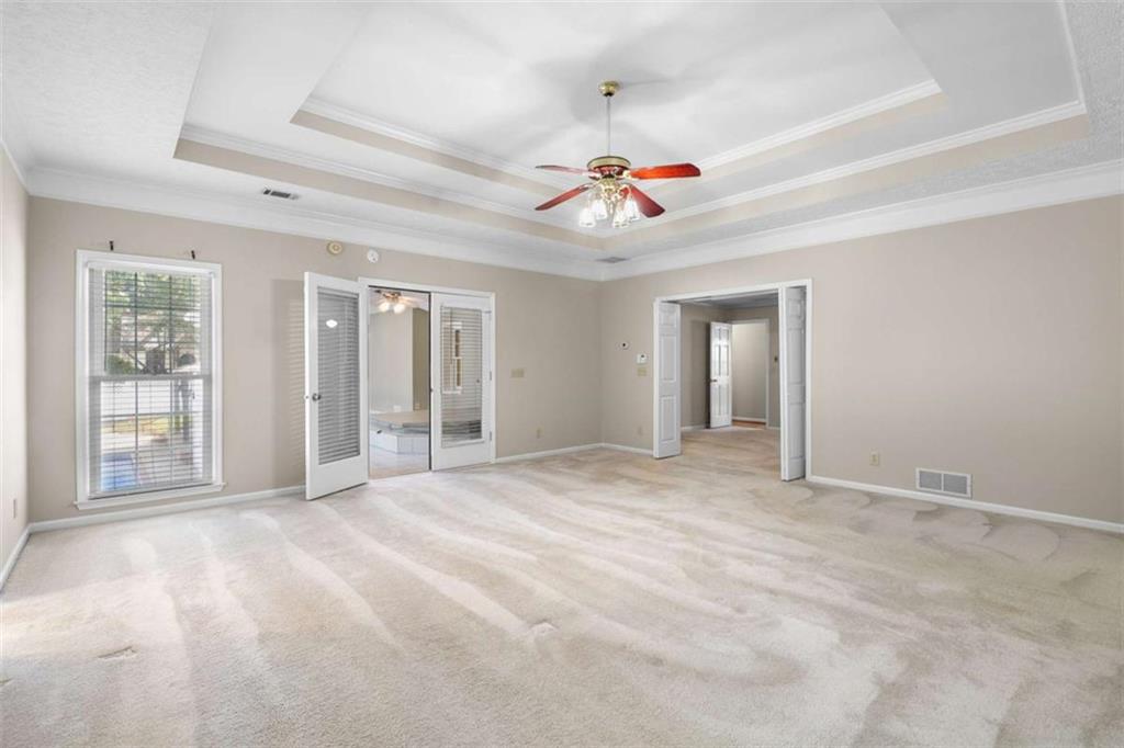 2678 North Bogan Road Northeast Buford, GA 30519 - Photo 16 of 52 a view of an empty room with a window