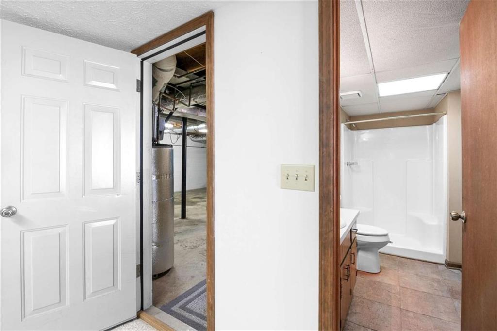 2678 North Bogan Road Northeast Buford, GA 30519 - Photo 22 of 52 a bathroom with a toilet