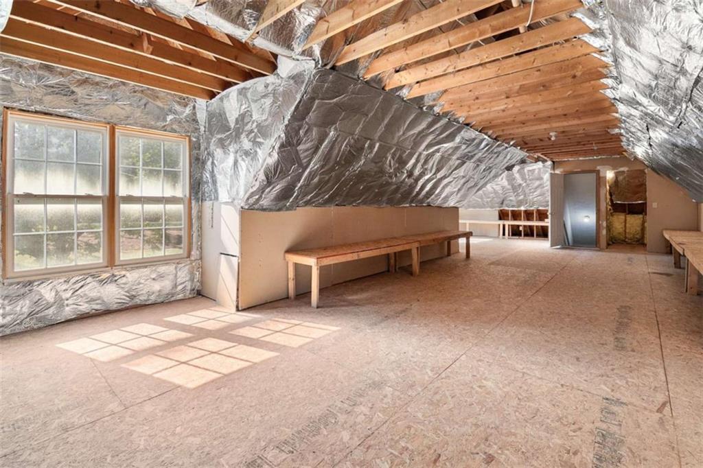 2678 North Bogan Road Northeast Buford, GA 30519 - Photo 36 of 52 a view of a house with a snow in the yard