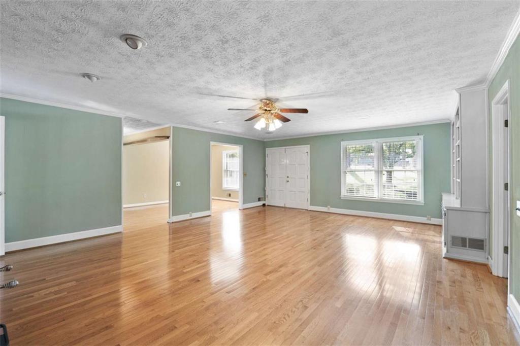 2678 North Bogan Road Northeast Buford, GA 30519 - Photo 47 of 52 a view of livingroom with hardwood