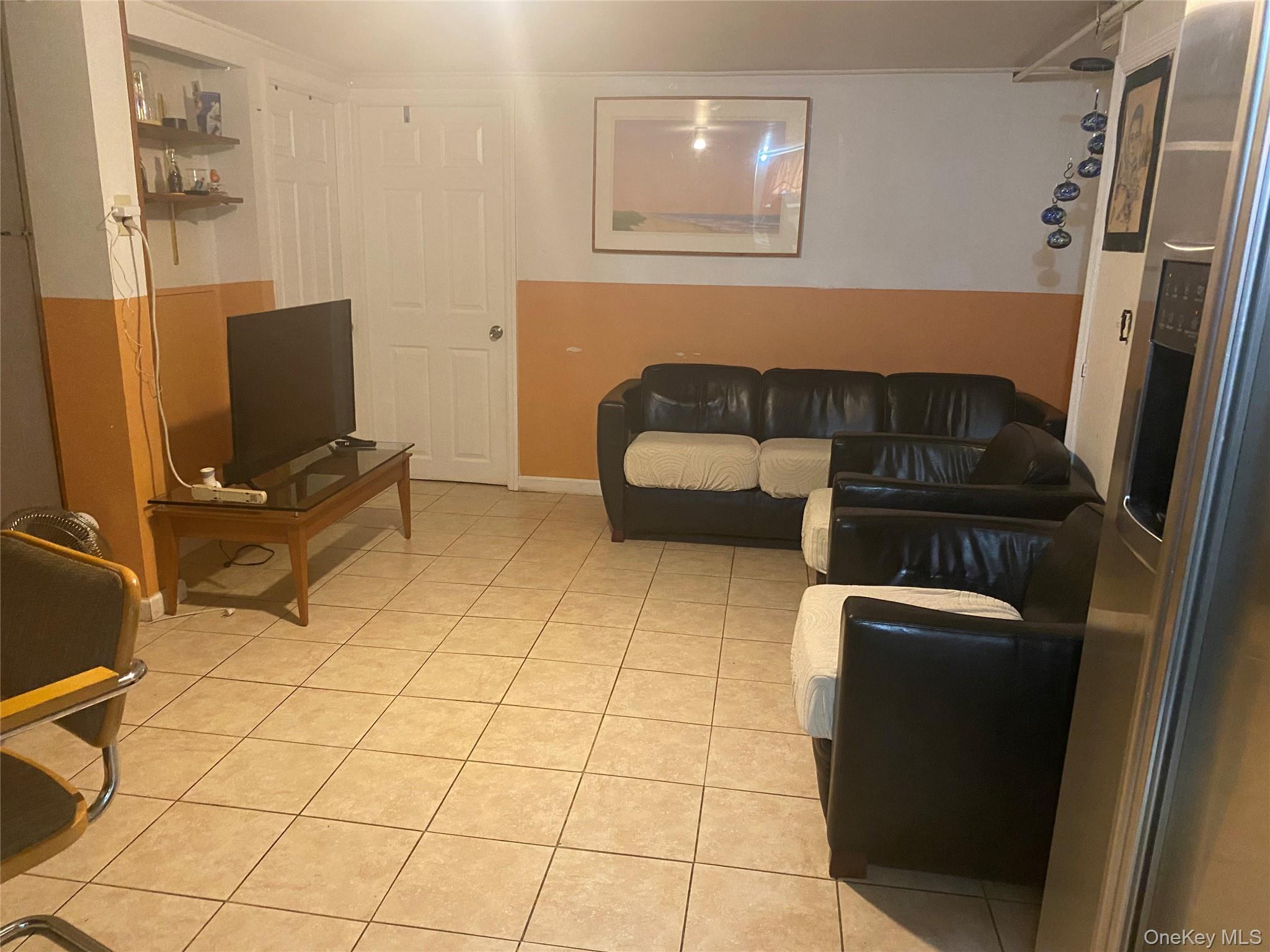 204 Beech Street Valley Stream, NY 11580 - Photo 12 of 18 a living room with furniture