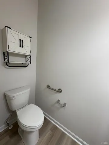 a bathroom with a toilet and a sink