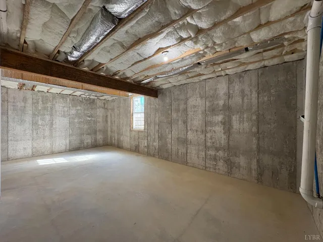 a view of a room with wooden walls