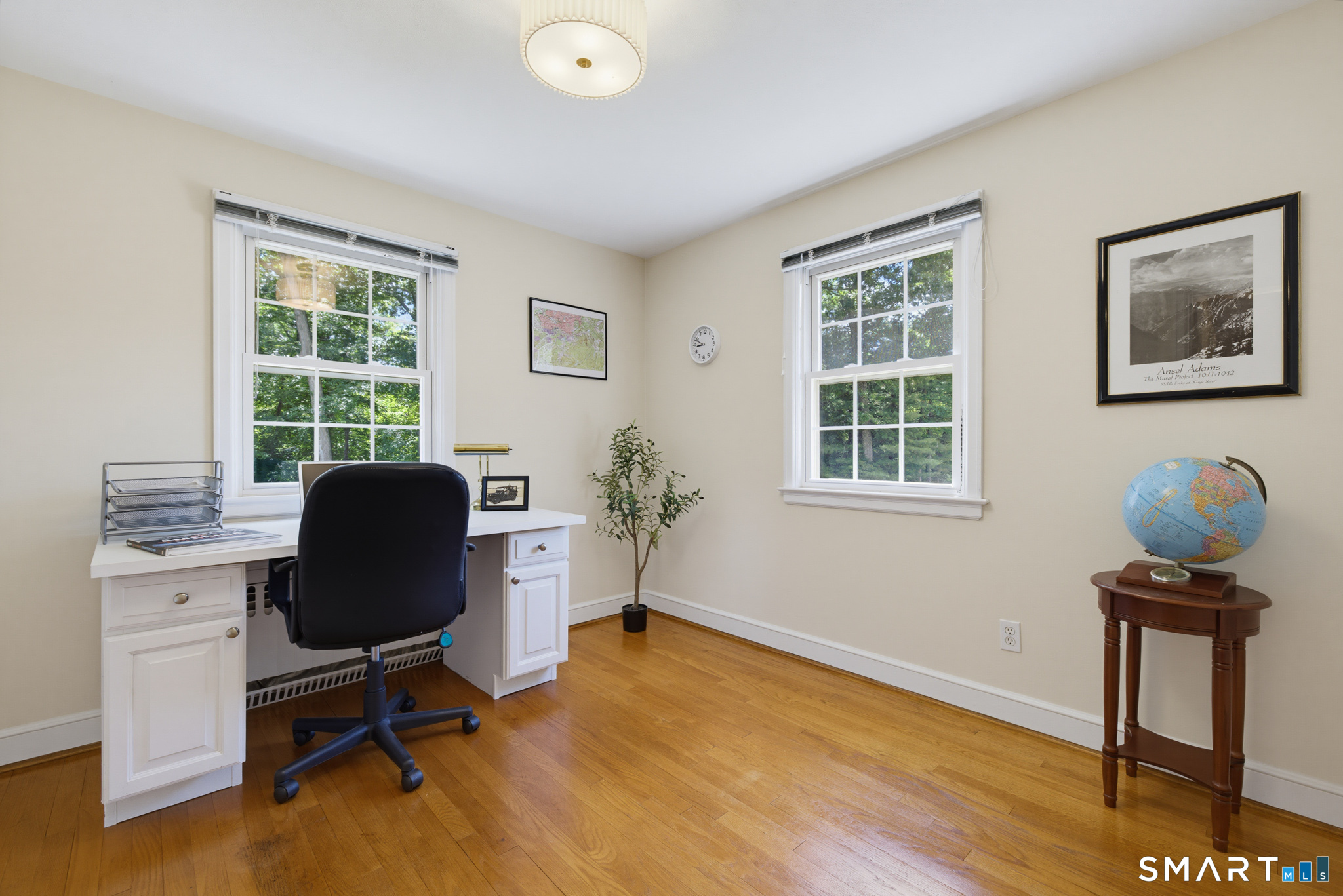224 Spring Street Manchester, CT 06040 - Photo 23 of 39 a view of a workspace with furniture and a window
