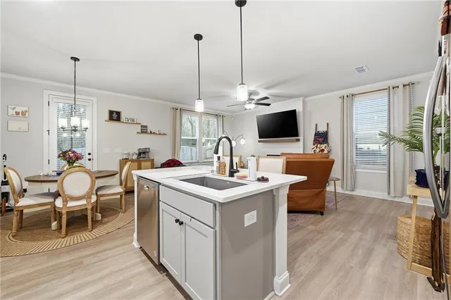 a bedroom with bed and a chair