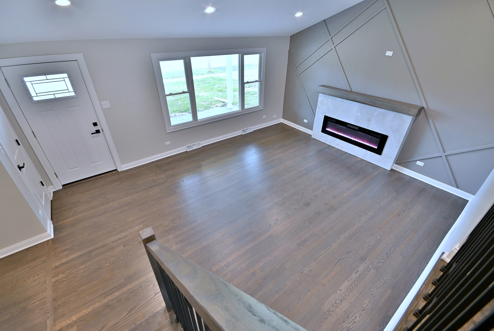 8218 Linder Avenue Burbank, IL 60459 - Photo 8 of 23 wooden floor in an empty room with a window