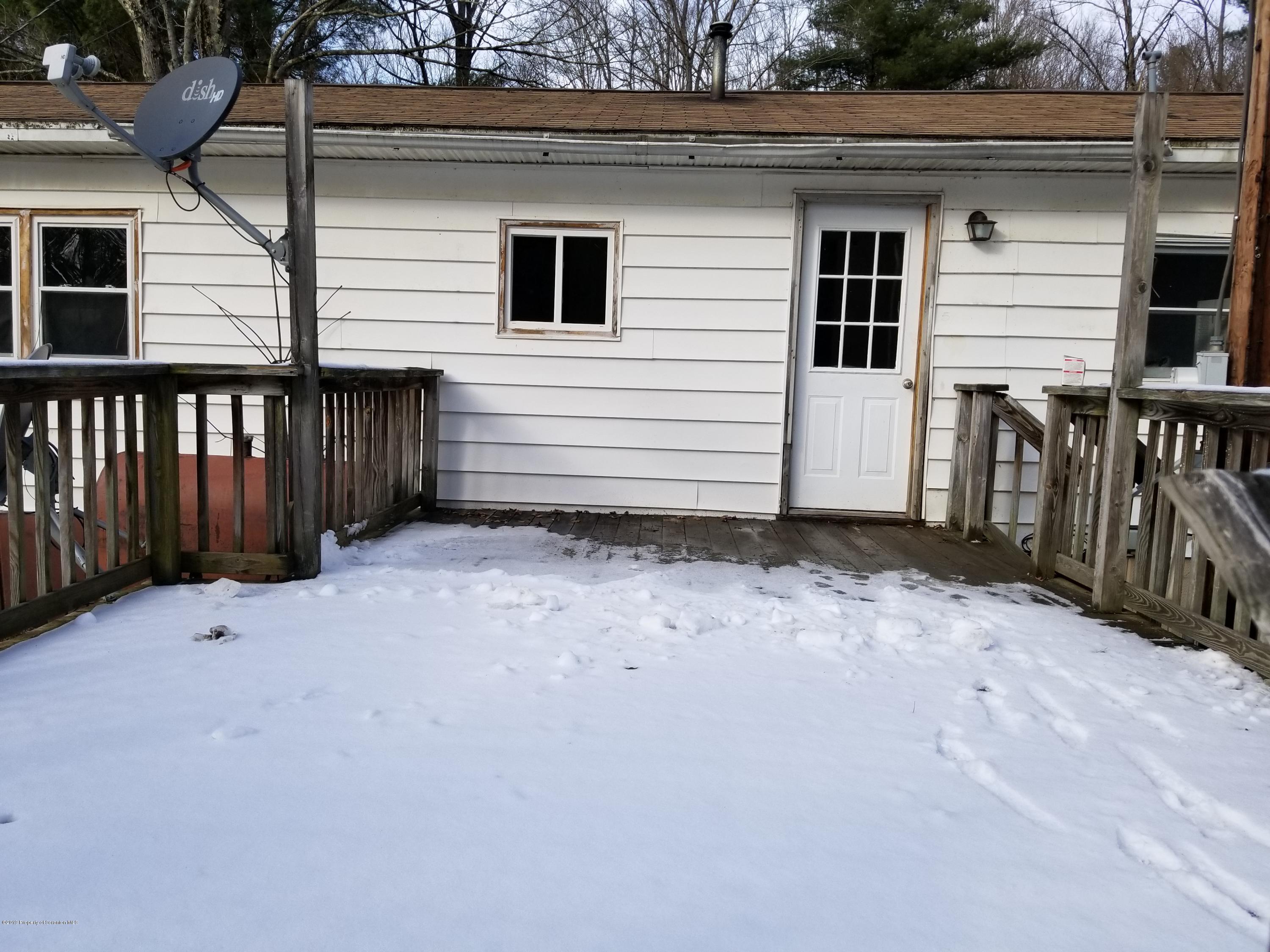 268 State Rte 4013 Little Meadows, PA 18830 - Photo 17 of 48 a view of a house with a backyard