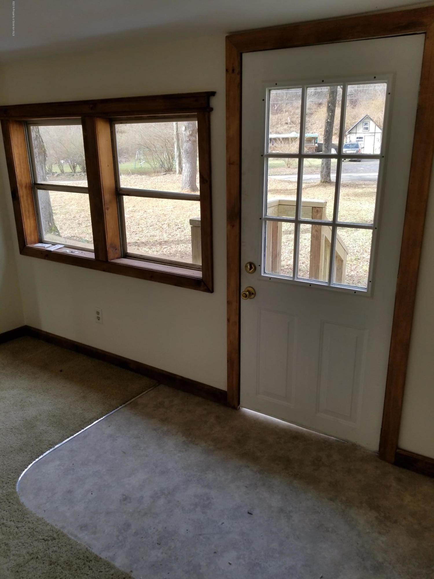 268 State Rte 4013 Little Meadows, PA 18830 - Photo 26 of 48 an empty room with a window