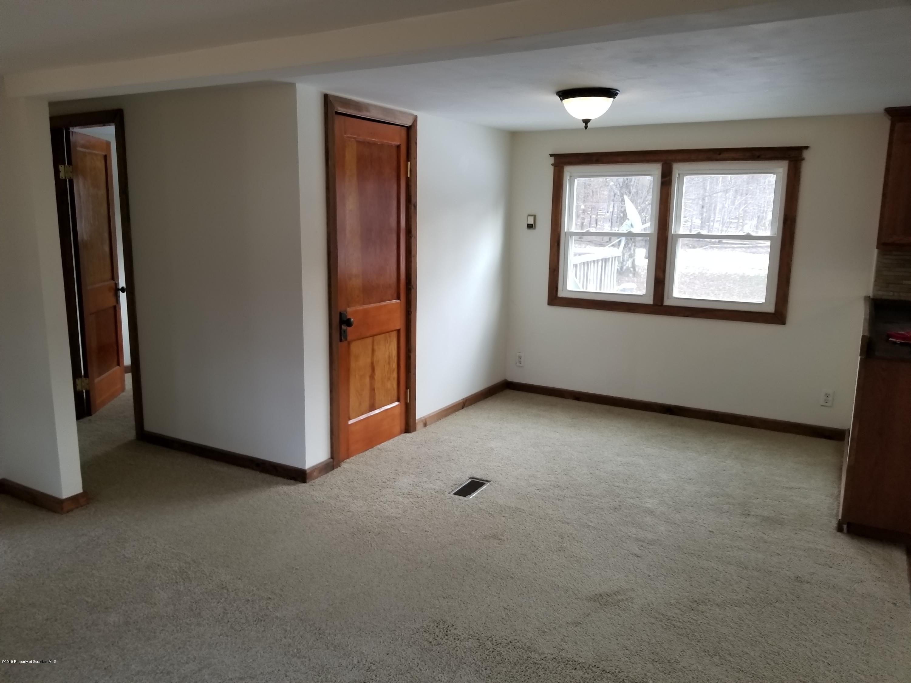 268 State Rte 4013 Little Meadows, PA 18830 - Photo 30 of 48 an empty room with windows and closet