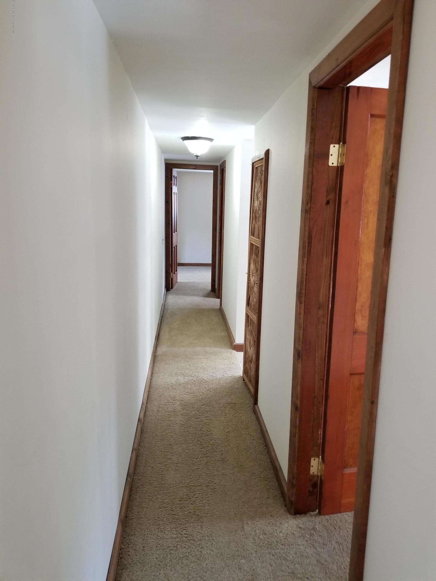 268 State Rte 4013 Little Meadows, PA 18830 - Photo 36 of 48 a view of a hallway with wooden floor
