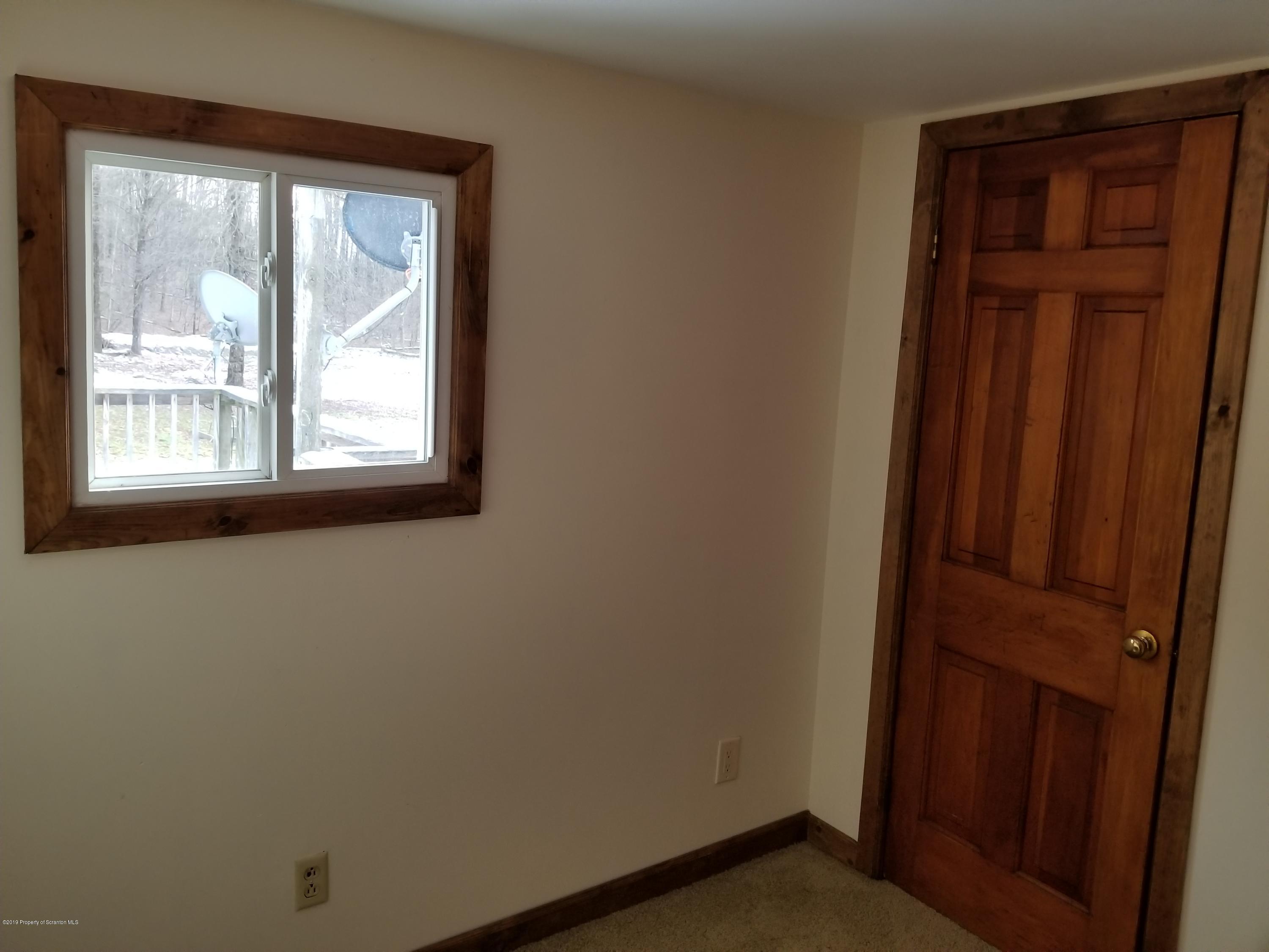 268 State Rte 4013 Little Meadows, PA 18830 - Photo 38 of 48 an empty room with windows