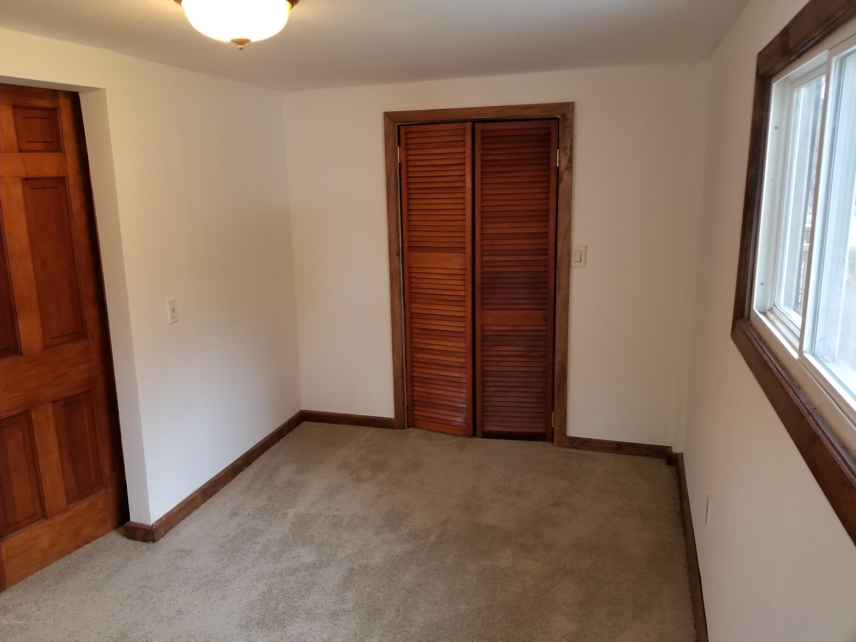 268 State Rte 4013 Little Meadows, PA 18830 - Photo 47 of 48 an empty room with windows