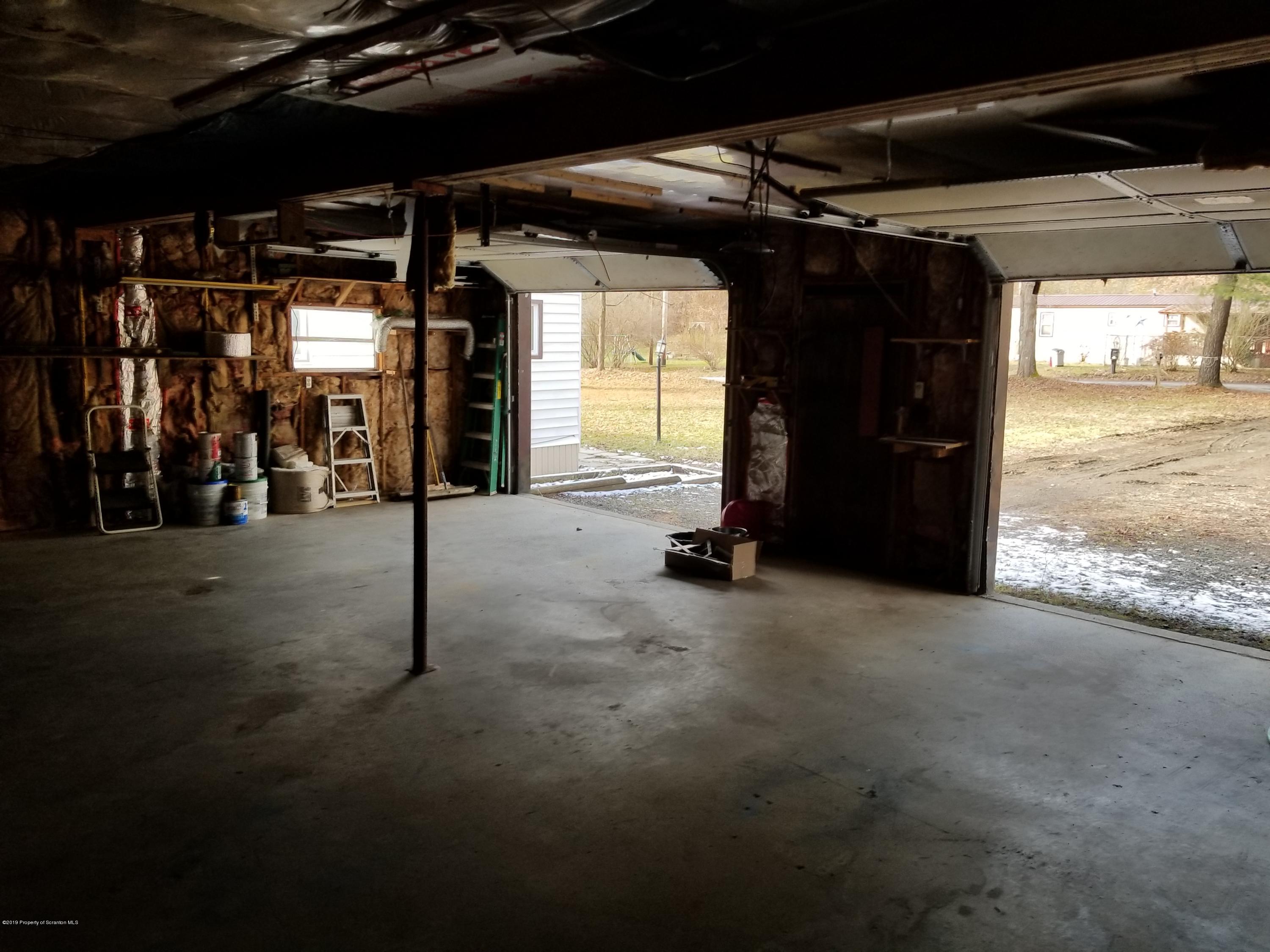 268 State Rte 4013 Little Meadows, PA 18830 - Photo 5 of 48 a view of an empty room with a window