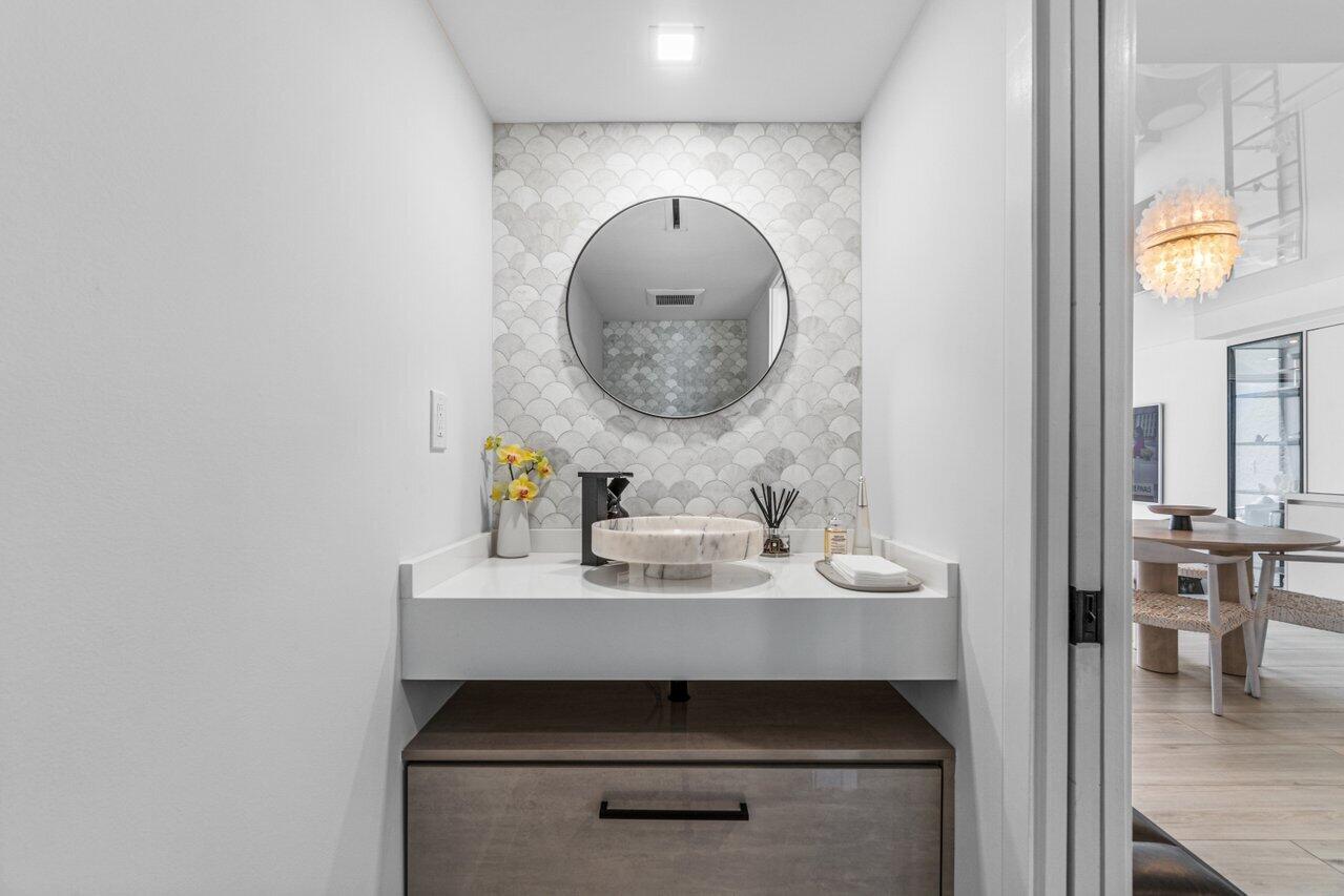 3115 South Ocean Boulevard, Unit 104 Highland Beach, FL 33487 - Photo 12 of 45 1st Floor Half Bath