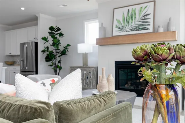a view of a dining room with furniture and window
