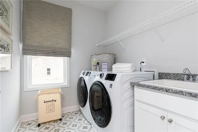 a view of a swimming pool with sitting area