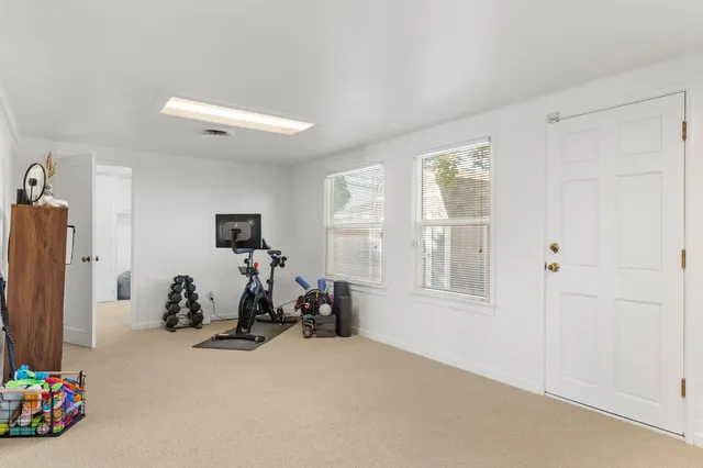 a view of a room with gym equipment