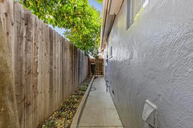 a view of a pathway of a wooden building
