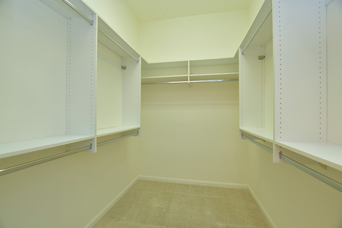 114 Lone Star Drive Georgetown, TX 78633 - Photo 24 of 30 Well-appointed closet space is seen in the primary closet.
