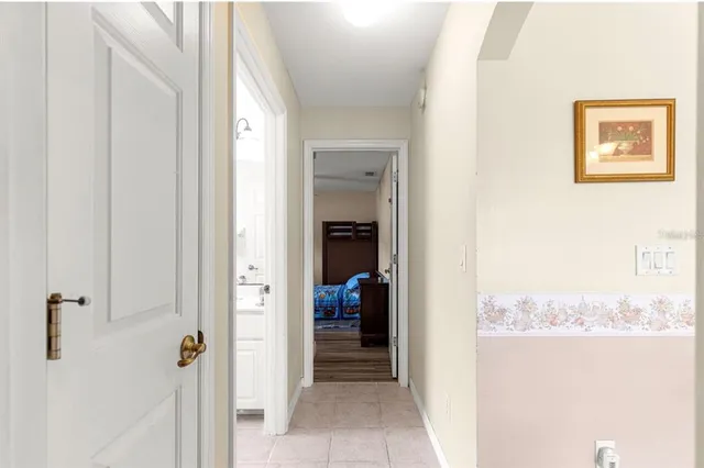 a bathroom with a sink toilet tub and shower