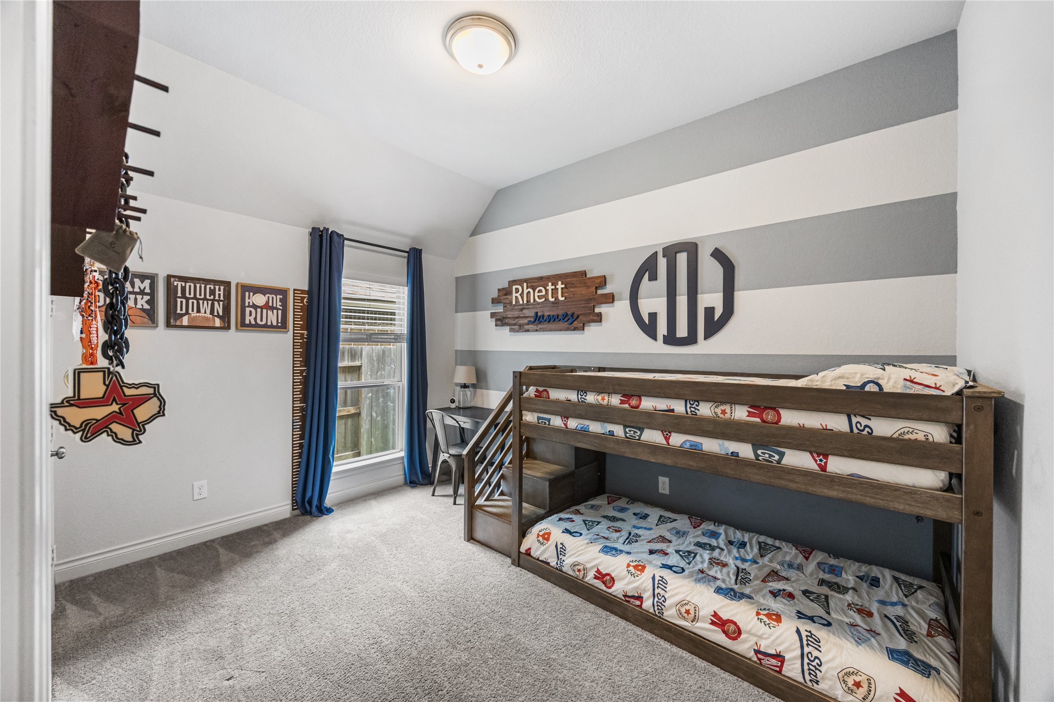 28169 Knight Peak Drive Spring, TX 77386 - Photo 22 of 33 a bedroom with a bed and a couch