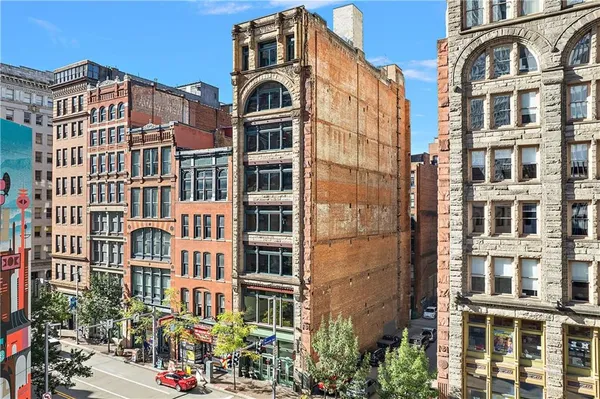 a front view of a multi story building