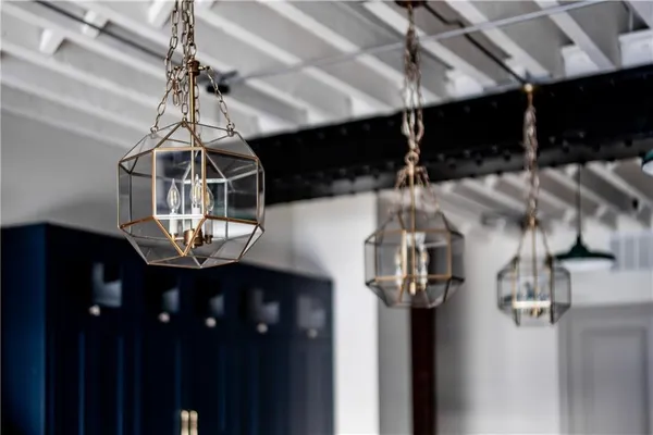 a kitchen with a refrigerator and a sink