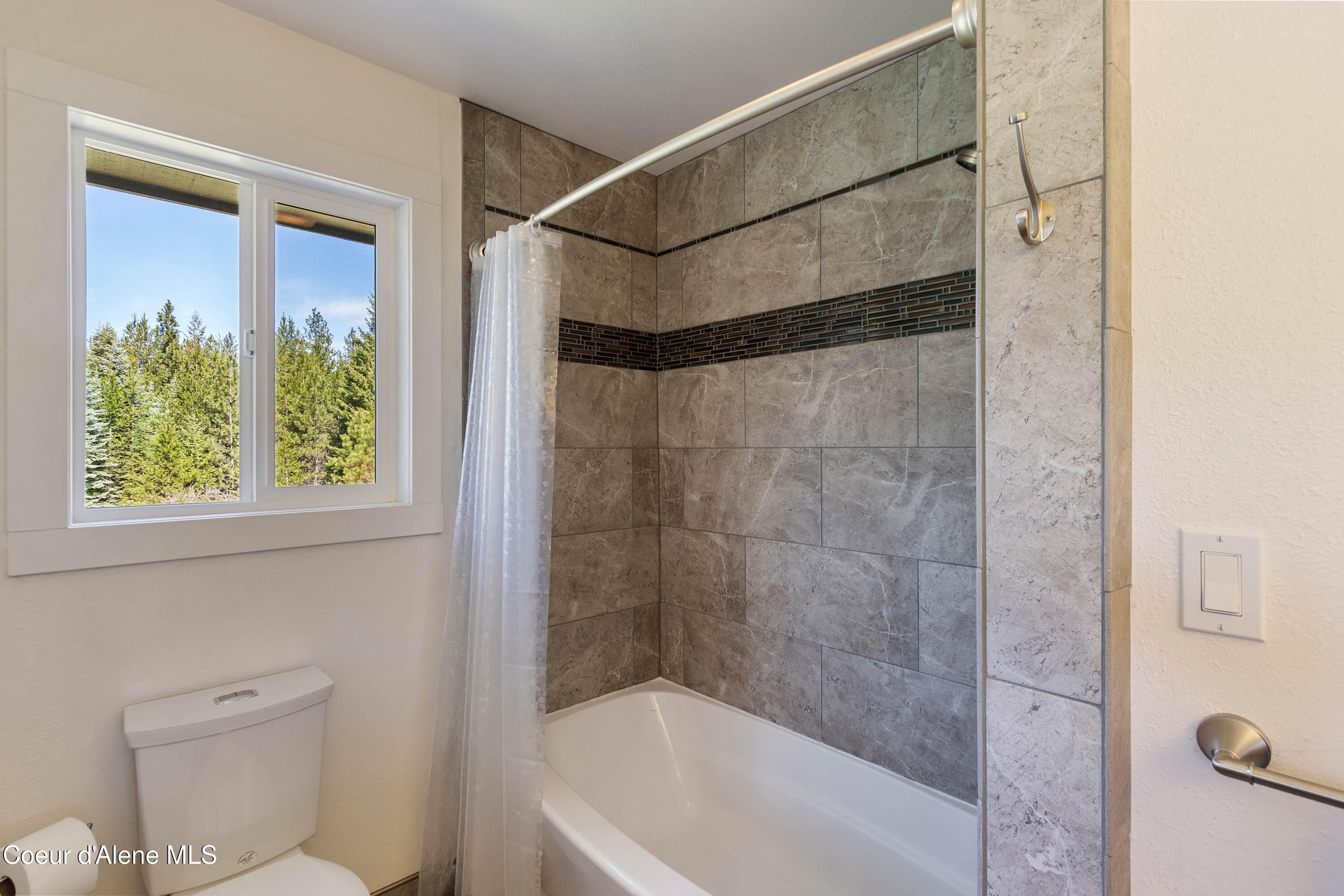 1169 Algoma Spur Road Sagle, ID 83860 - Photo 13 of 41 Master Bathroom Shower