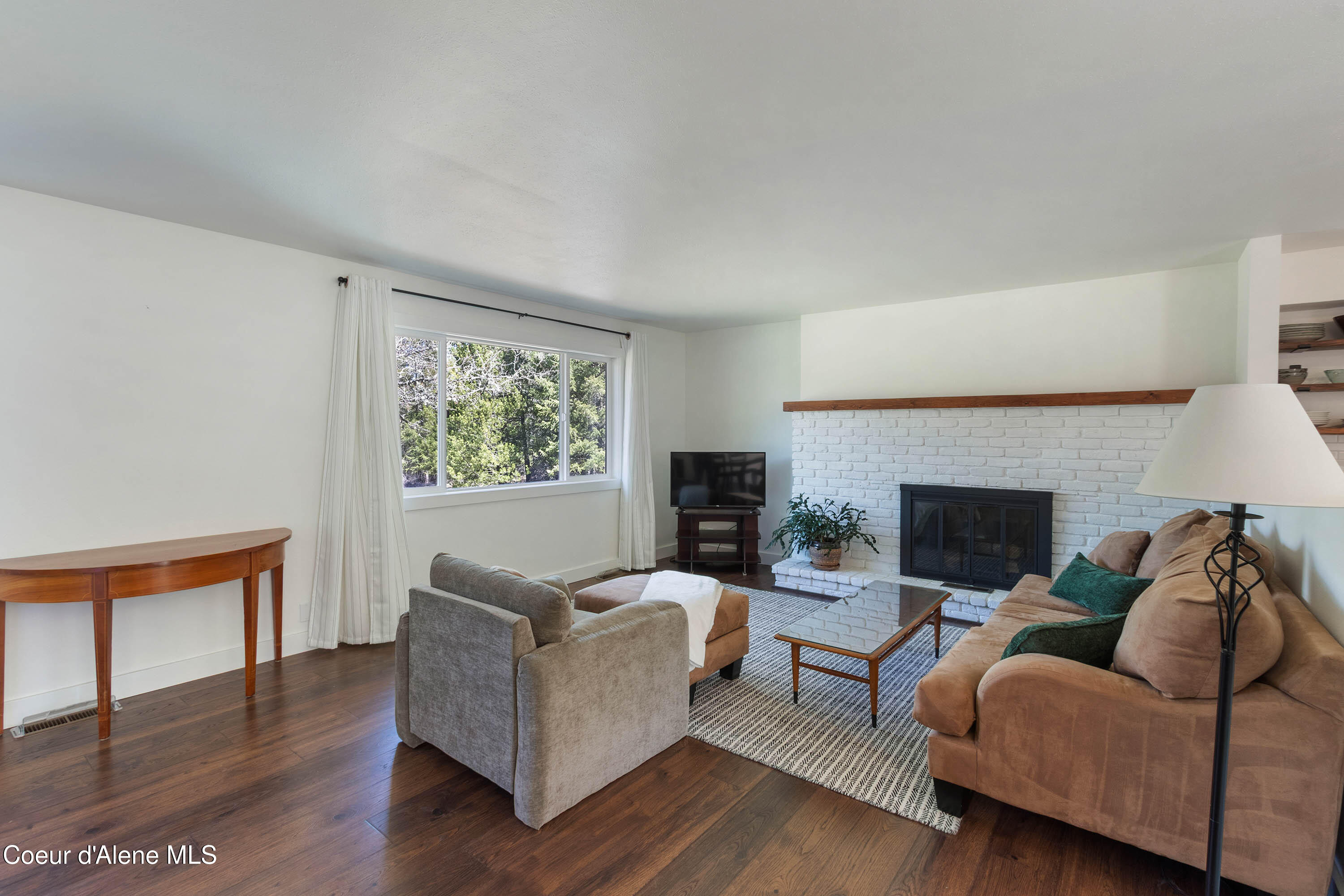 1169 Algoma Spur Road Sagle, ID 83860 - Photo 3 of 41 Living Room Fireplacee