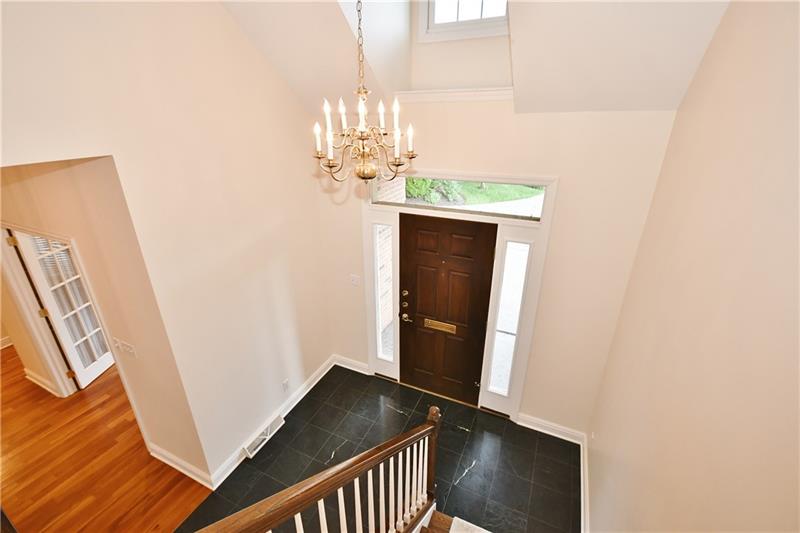 115 Haverford Circle Pittsburgh, PA 15228 - Photo 2 of 25 Impressive front entrance foyer welcomes you into the home. There is also a separate entrance through the two car garage and main floor laundry room.