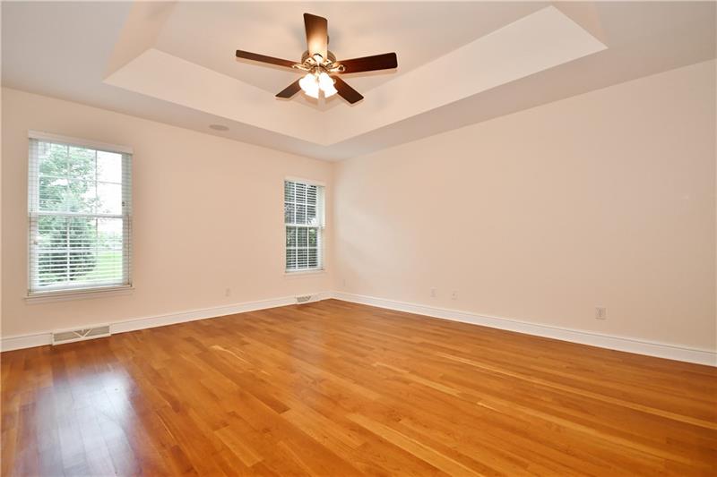 115 Haverford Circle Pittsburgh, PA 15228 - Photo 11 of 25 Main 1st floor master bedroom, with ceiling fan. Also features two walk-in closets.