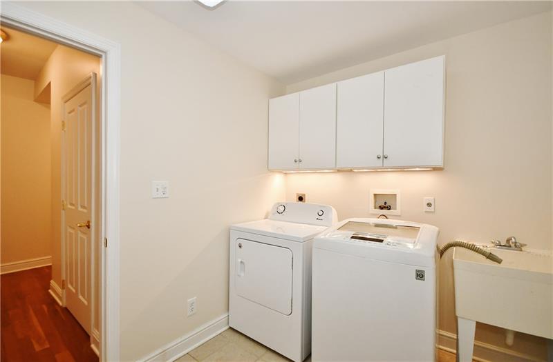 115 Haverford Circle Pittsburgh, PA 15228 - Photo 13 of 25 The main 1st floor laundry room can be accessed either through the hallway, or the oversized two car garage.